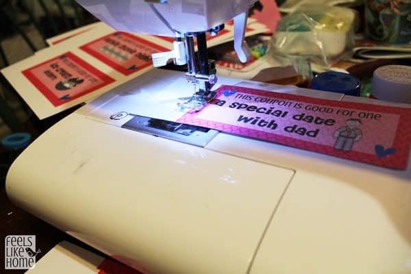 Perforate the coupons by sewing with a sewing machine with no thread